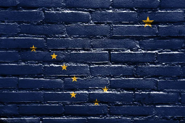 Alaska State Flag painted on brick wall — Stock Photo, Image