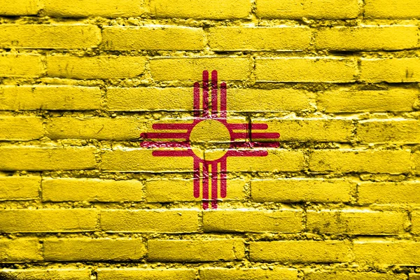 New mexico state flagga målade på tegelvägg — Stockfoto