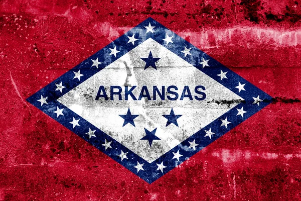 Arkansas state flagga målade på grunge vägg — Stockfoto