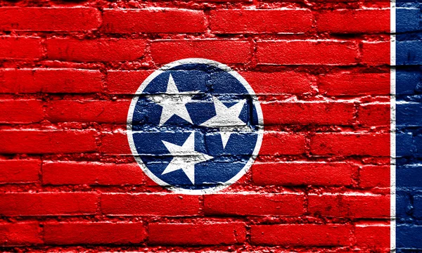 Флаг штата Теннесси, нарисованный на кирпичной стене — стоковое фото
