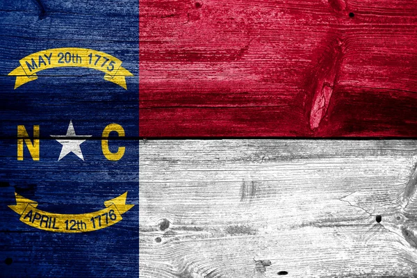 North Carolina State Bandiera dipinta su legno vecchio — Foto Stock