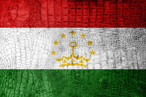 Tadzjikistans flagga målade på lyxiga krokodil konsistens — Stockfoto