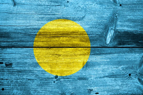 Palau flaggan målad på gamla trä planka konsistens — Stockfoto