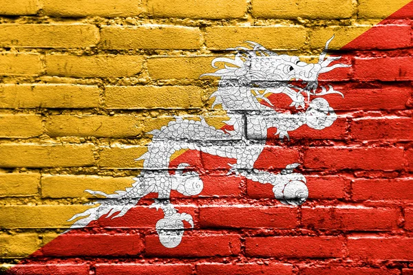 Bhutan vlag geschilderd op de muur — Stockfoto