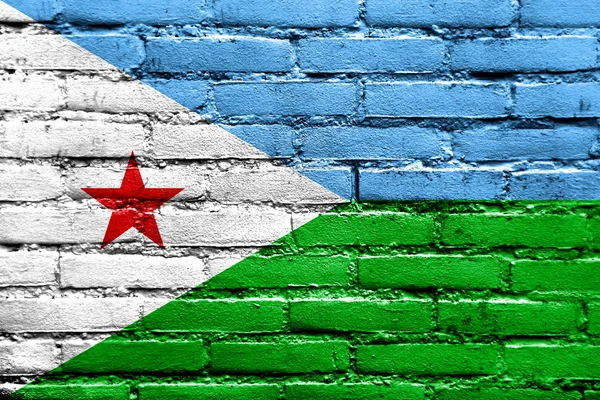Djibouti Flag painted on brick wall — Stock Photo, Image