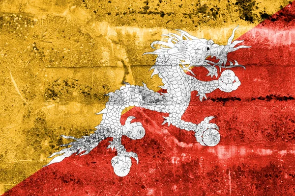 Grunge duvara boyalı bhutan bayrağı — Stok fotoğraf