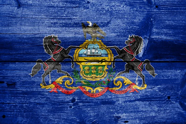 Pennsylvania state flagga målade på gamla trä planka konsistens — Stockfoto