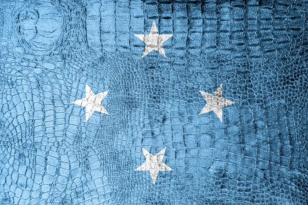 Micronesia, Federale Staten vlag geschilderd op luxe krokodil textuur — Stockfoto