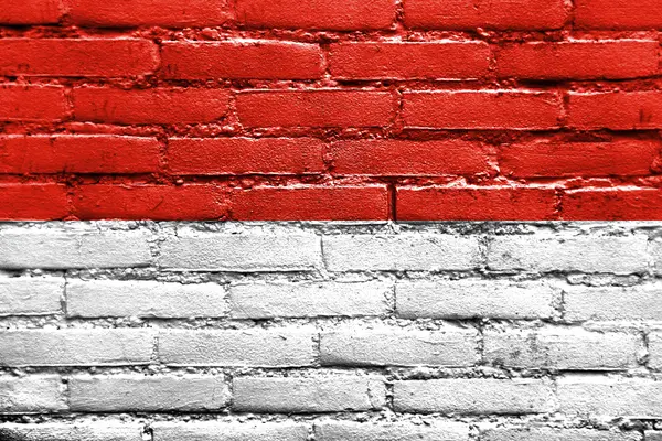 Monaco Flag painted on brick wall — Stock Photo, Image