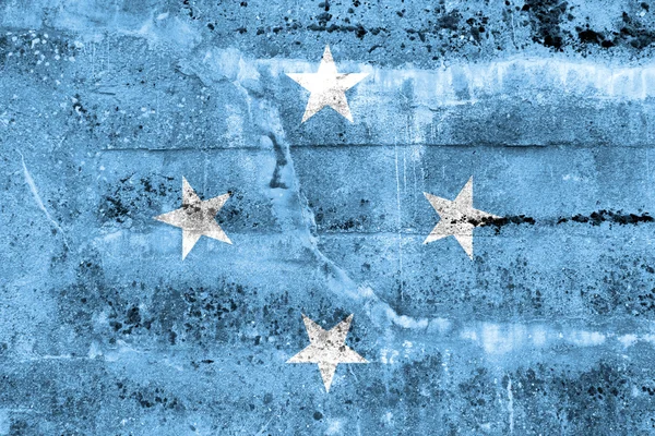 Flaga Mikronezji namalowane na ścianie grunge — Zdjęcie stockowe