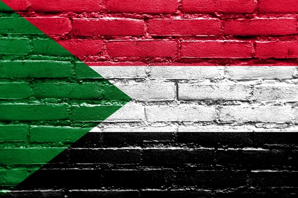 Флаг Судана раскрашен на кирпичной стене — стоковое фото