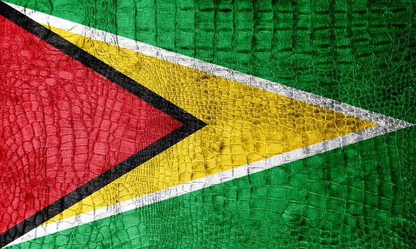 Guyana Flag painted on luxury crocodile texture — Stock Photo, Image