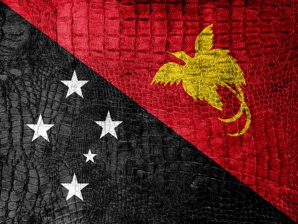 Papua Nya Guineas flagga målade på lyxiga krokodil konsistens — Stockfoto