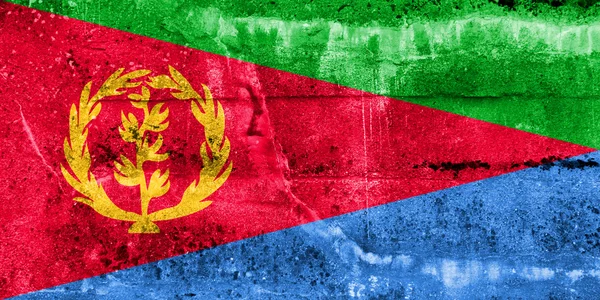 Eritrea flagga målade på grunge vägg — Stockfoto