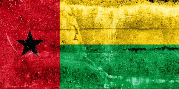 Vlajka Guineje bissau maloval na zdi grunge — Stock fotografie