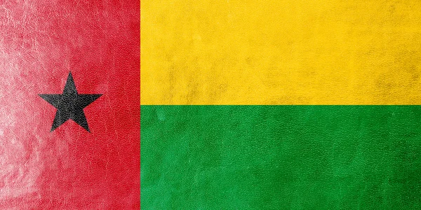 Guinee bissau vlag geschilderd op leder texture — Stockfoto