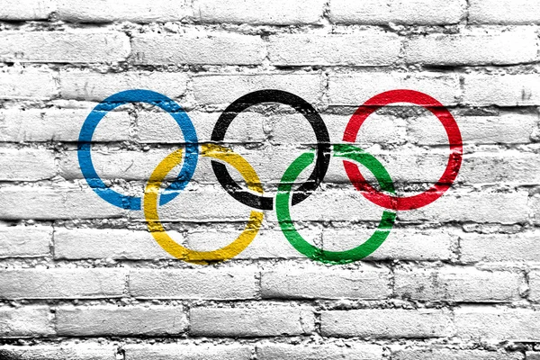 Olimpiyat bayrağı tuğla duvara boyalı — Stok fotoğraf