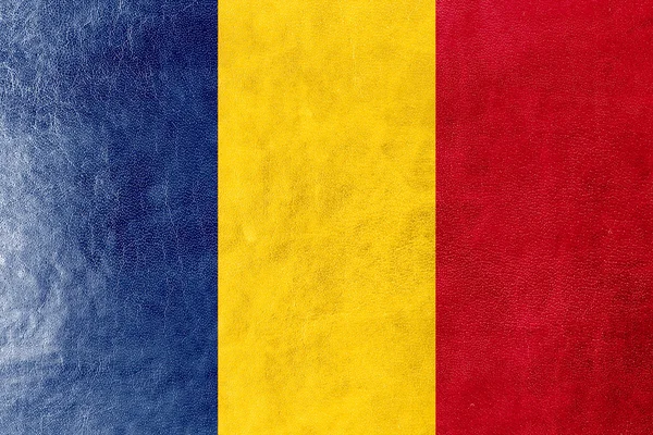 Tchads flagga målade på läder texture — Stockfoto