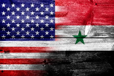 eski ahşap tahta dokusu üzerinde ABD ve Suriye bayrağı boyalı