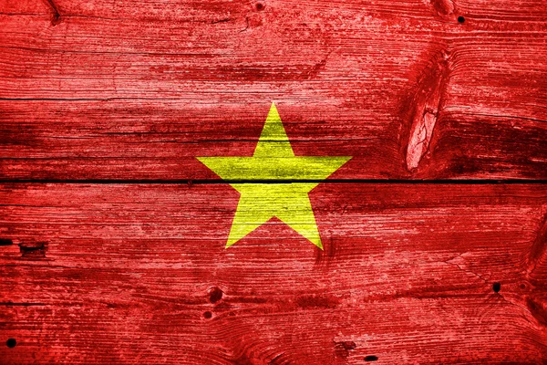 Bandera de Vietnam pintada sobre madera vieja textura del tablón —  Fotos de Stock