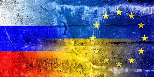 Bandera de Ucrania, la UE y Rusia pintada en la pared grunge — Foto de Stock