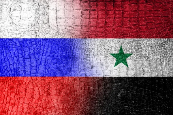 Rusko a Sýrie vlajku namaloval na luxusní krokodýlí textura — Stock fotografie