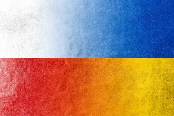 Polen und Ukraine Flagge auf Leder Textur gemalt — Stockfoto