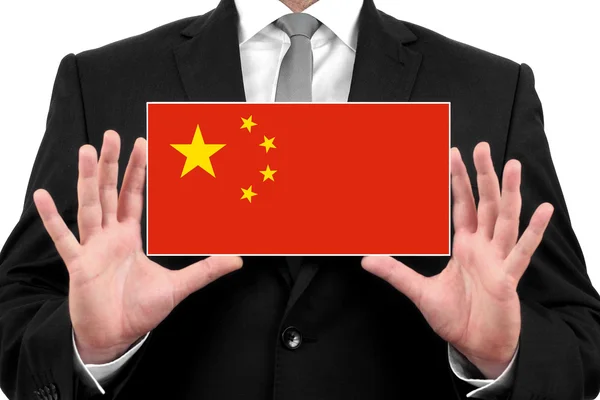 Бизнесмен с визитной карточкой под китайским флагом — стоковое фото