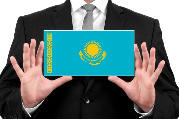 Geschäftsmann mit Visitenkarte mit Kasachstan-Fahne — Stockfoto
