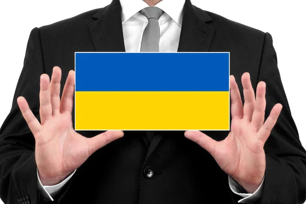 Geschäftsmann mit einer Visitenkarte mit ukrainischer Flagge — Stockfoto