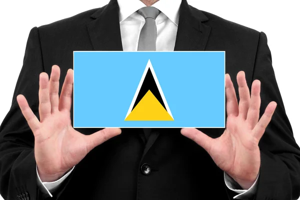 Businessman holding a business card with Saint Lucia Flag — Stock Photo, Image