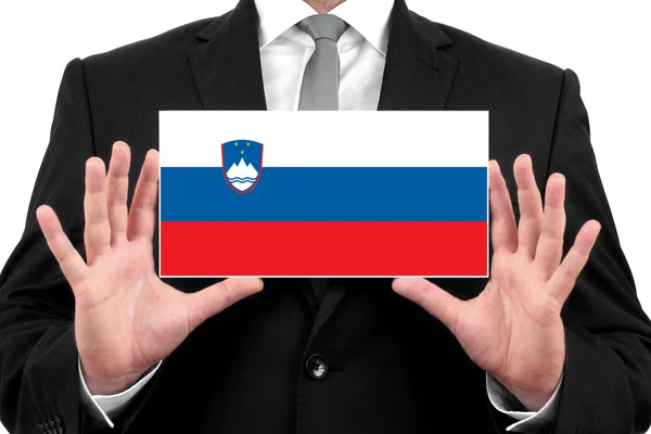 Empresário titular de um cartão de visita com a Eslovénia Bandeira — Fotografia de Stock