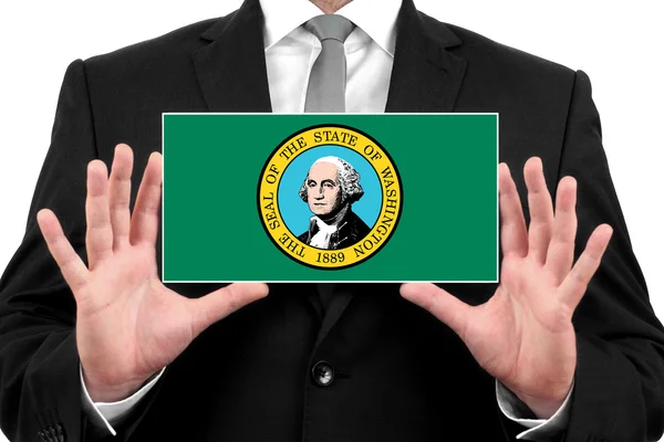 Επιχειρηματίας που κατέχει μια επαγγελματική κάρτα με κρατική σημαία της Ουάσιγκτον — Φωτογραφία Αρχείου