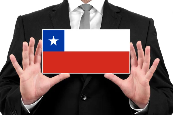Geschäftsmann mit einer Visitenkarte mit chilenischer Flagge — Stockfoto