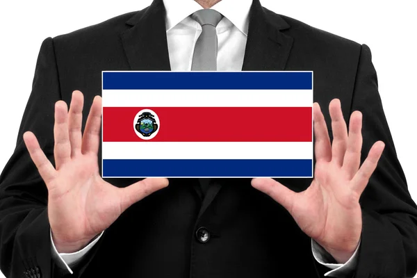 Geschäftsmann mit Visitenkarte mit Costa Rica-Fahne — Stockfoto