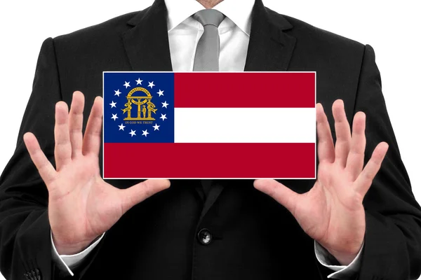 ジョージアの州の旗とのビジネス カードを保持している実業家 — ストック写真