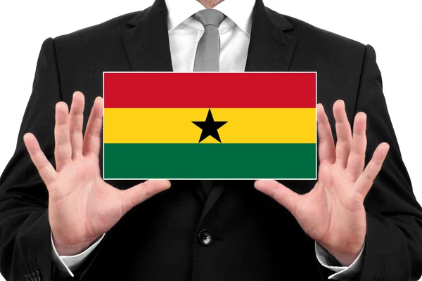 Homme d'affaires titulaire d'une carte de visite avec le drapeau du Ghana — Photo