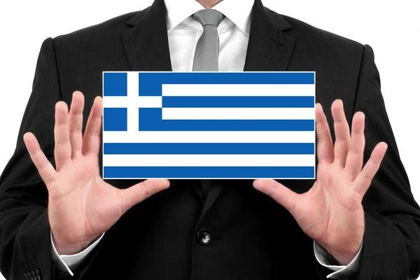 Affärsman som innehar ett visitkort med Grekland flagga — Stockfoto