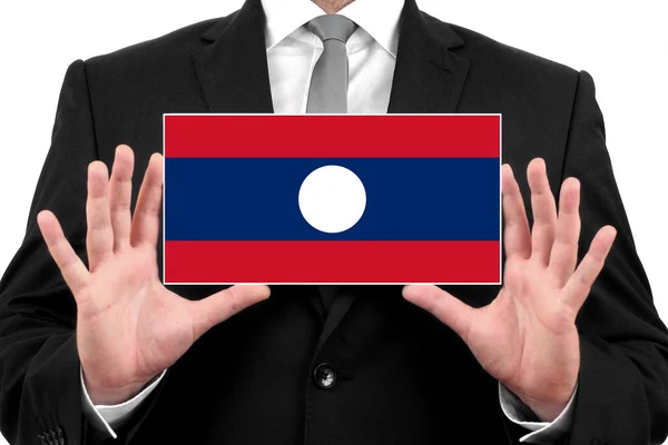 Empresario con tarjeta de visita con bandera de Laos — Foto de Stock