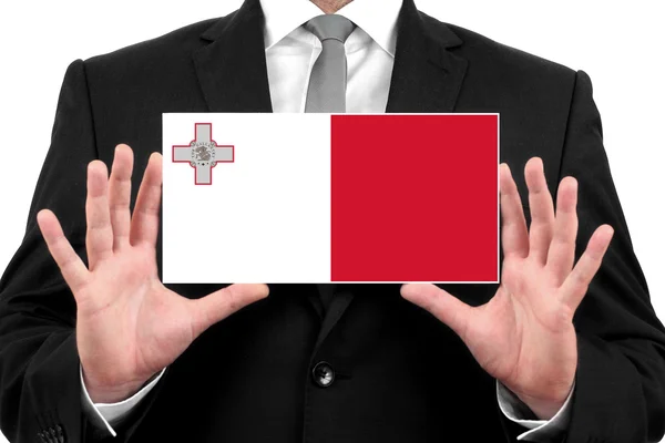 Empresario con una tarjeta de visita con bandera de Malta —  Fotos de Stock