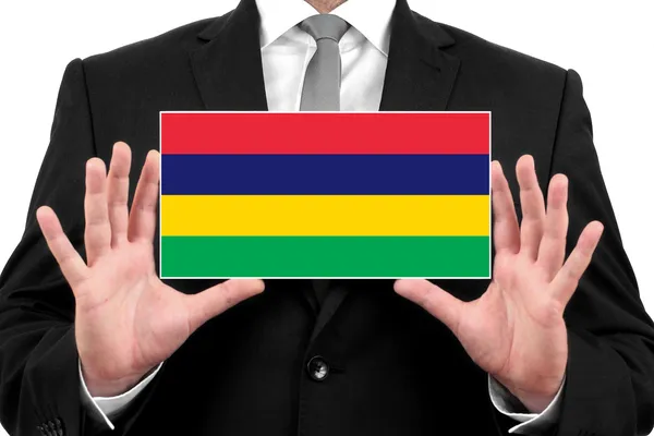 Businessman holding a business card with Mauritius Flag — Stock Photo, Image