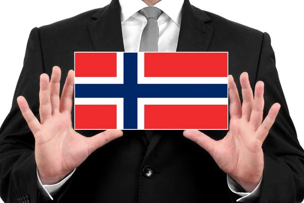 Affärsman som innehar ett visitkort med Norge flagga — Stockfoto