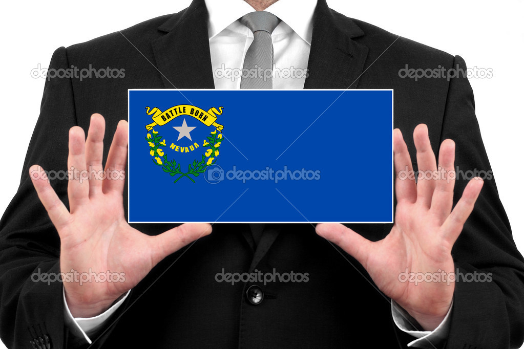 Businessman holding a business card with Nevada State Flag