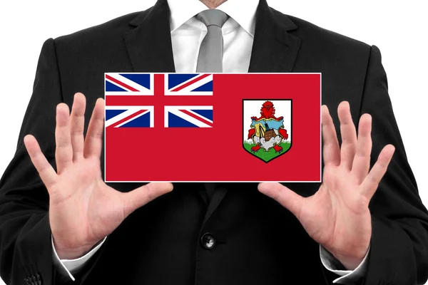 Empresario con tarjeta de visita con bandera de las Bermudas — Foto de Stock