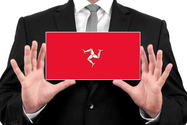 Businessman holding a business card with Isle of Man Flag — Stock Photo, Image