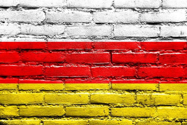 South Ossetia Flag painted on brick wall — Stock Photo, Image