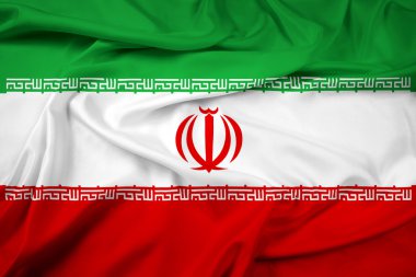 İran bayrağı sallayarak