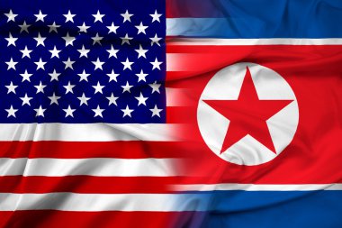 ABD ve Kuzey Kore bayrağı sallayarak