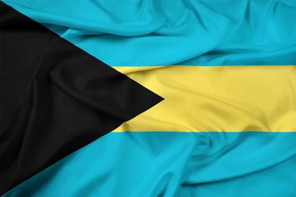 Размахивая флагом Багамских островов — стоковое фото
