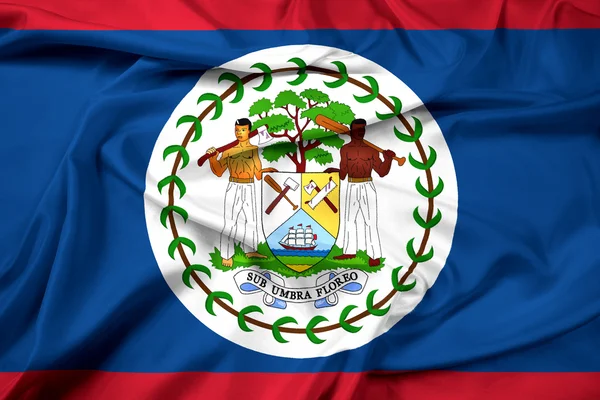 Belize bayrağı sallayarak — Stok fotoğraf